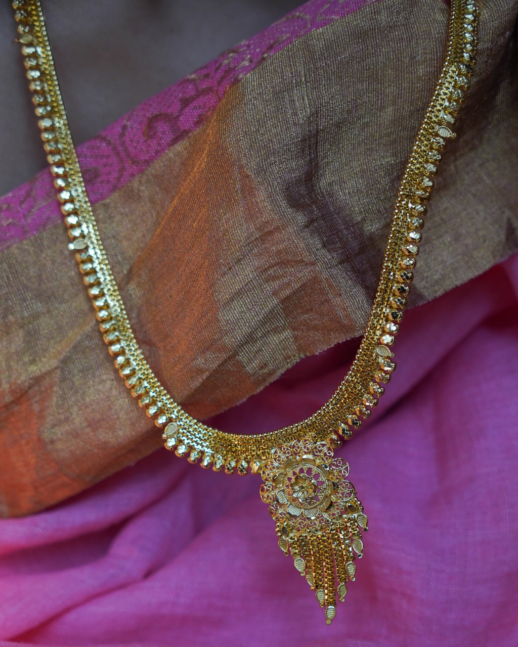 ORO-  Premium 1 Gram Gold Plated Traditional Long Haram Set | Micro Plated Sleek Rani Haar with Central Floral Pendant and Matching Earrings