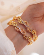 ZORA - Premium 1 Gram Gold Plated Wavy Leaf Bangles | Micro Plated American Diamond Twisted Wave Bracelets Set of 2