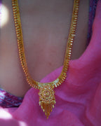 ORO-  Premium 1 Gram Gold Plated Traditional Long Haram Set | Micro Plated Sleek Rani Haar with Central Floral Pendant and Matching Earrings