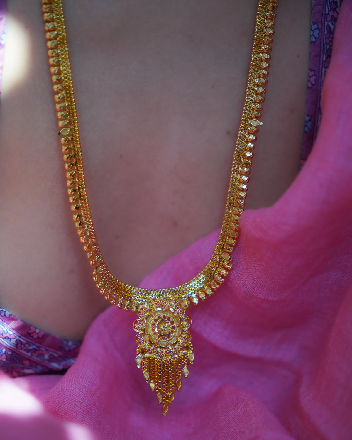 ORO-  Premium 1 Gram Gold Plated Traditional Long Haram Set | Micro Plated Sleek Rani Haar with Central Floral Pendant and Matching Earrings