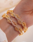 ZORA - Premium 1 Gram Gold Plated Wavy Leaf Bangles | Micro Plated American Diamond Twisted Wave Bracelets Set of 2
