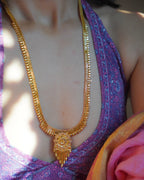 ORO-  Premium 1 Gram Gold Plated Traditional Long Haram Set | Micro Plated Sleek Rani Haar with Central Floral Pendant and Matching Earrings