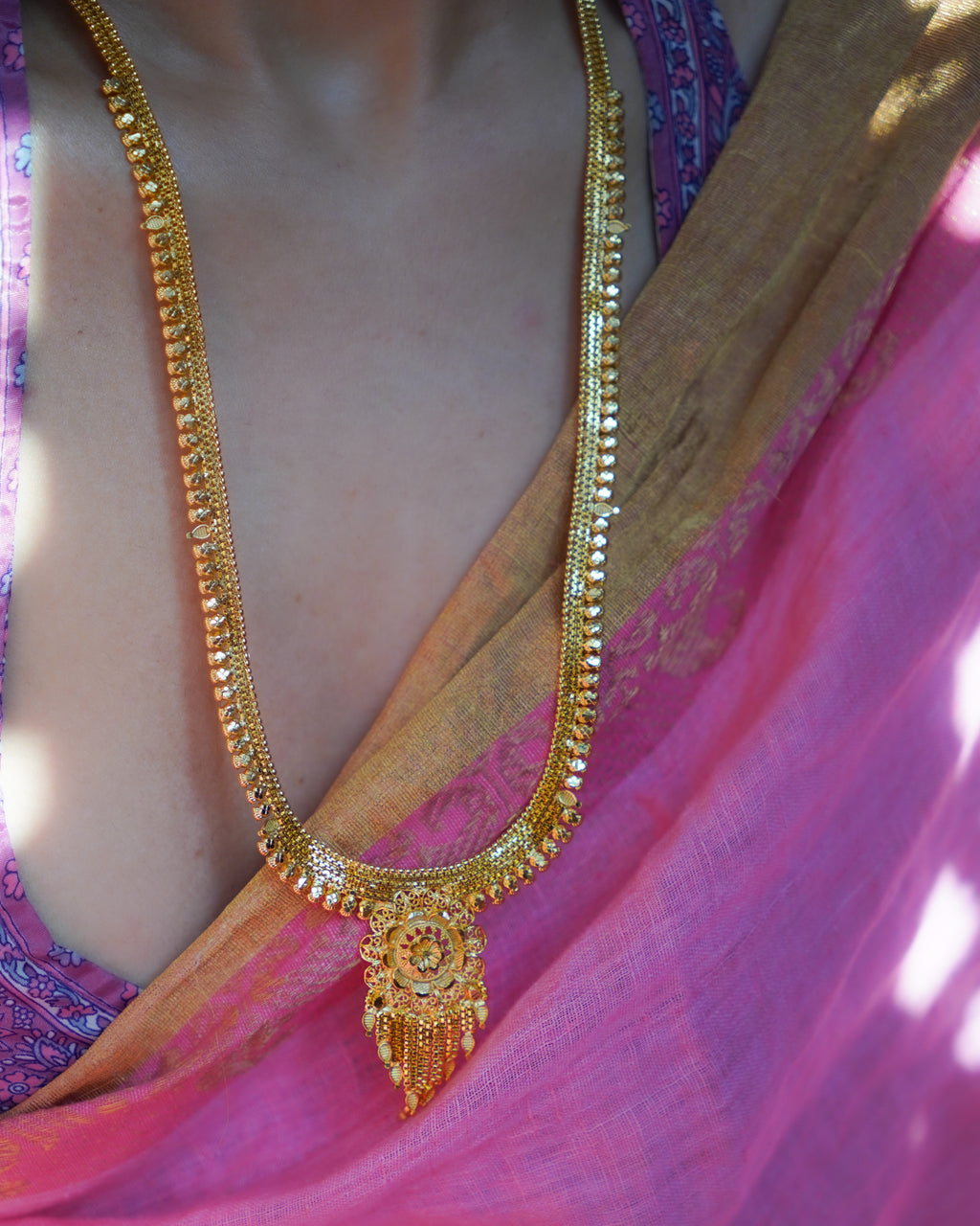 ORO-  Premium 1 Gram Gold Plated Traditional Long Haram Set | Micro Plated Sleek Rani Haar with Central Floral Pendant and Matching Earrings