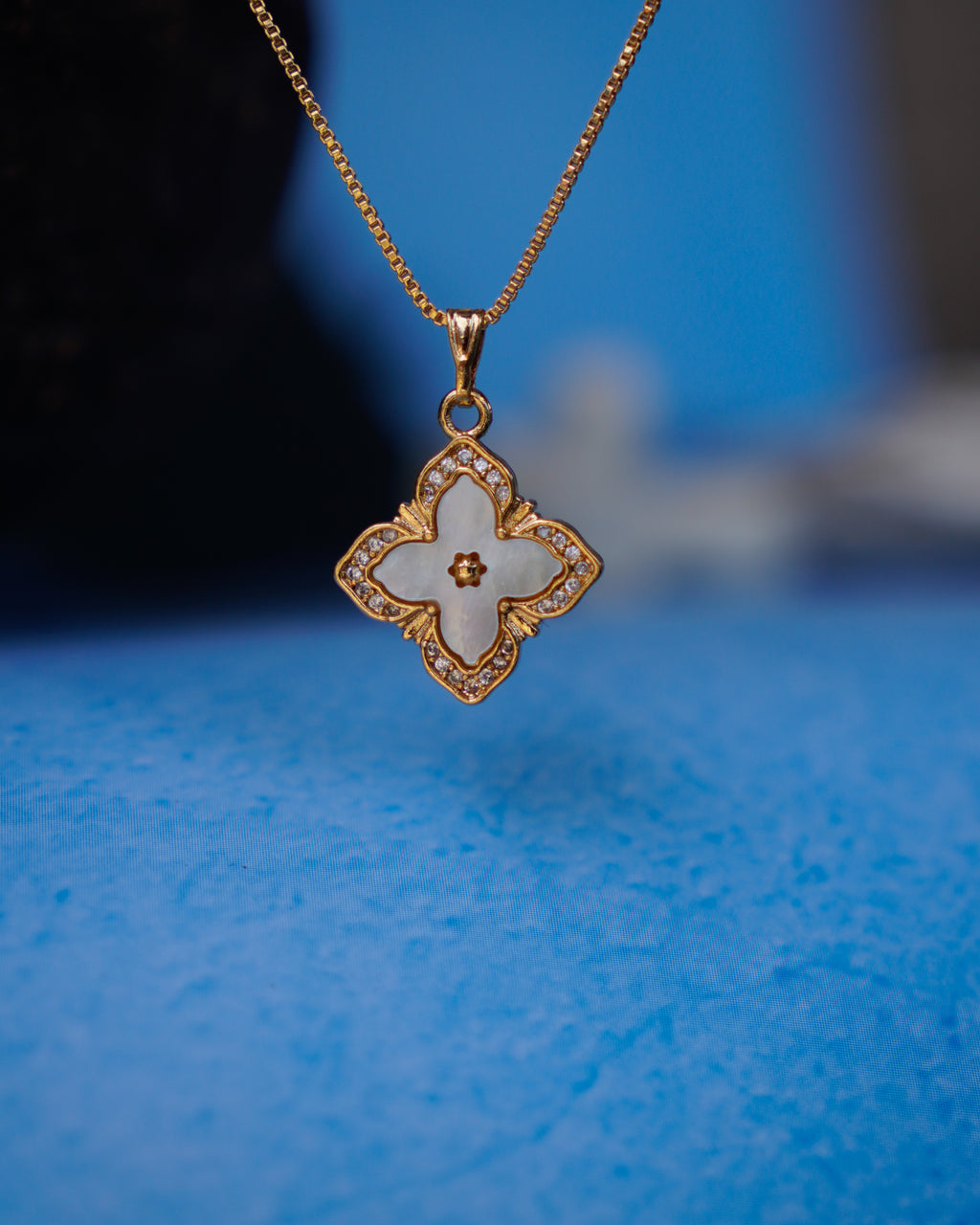 FLORA- Anti-Tarnish Gold Finish AD Clover Pendant Necklace with Mother of Pearl Shell