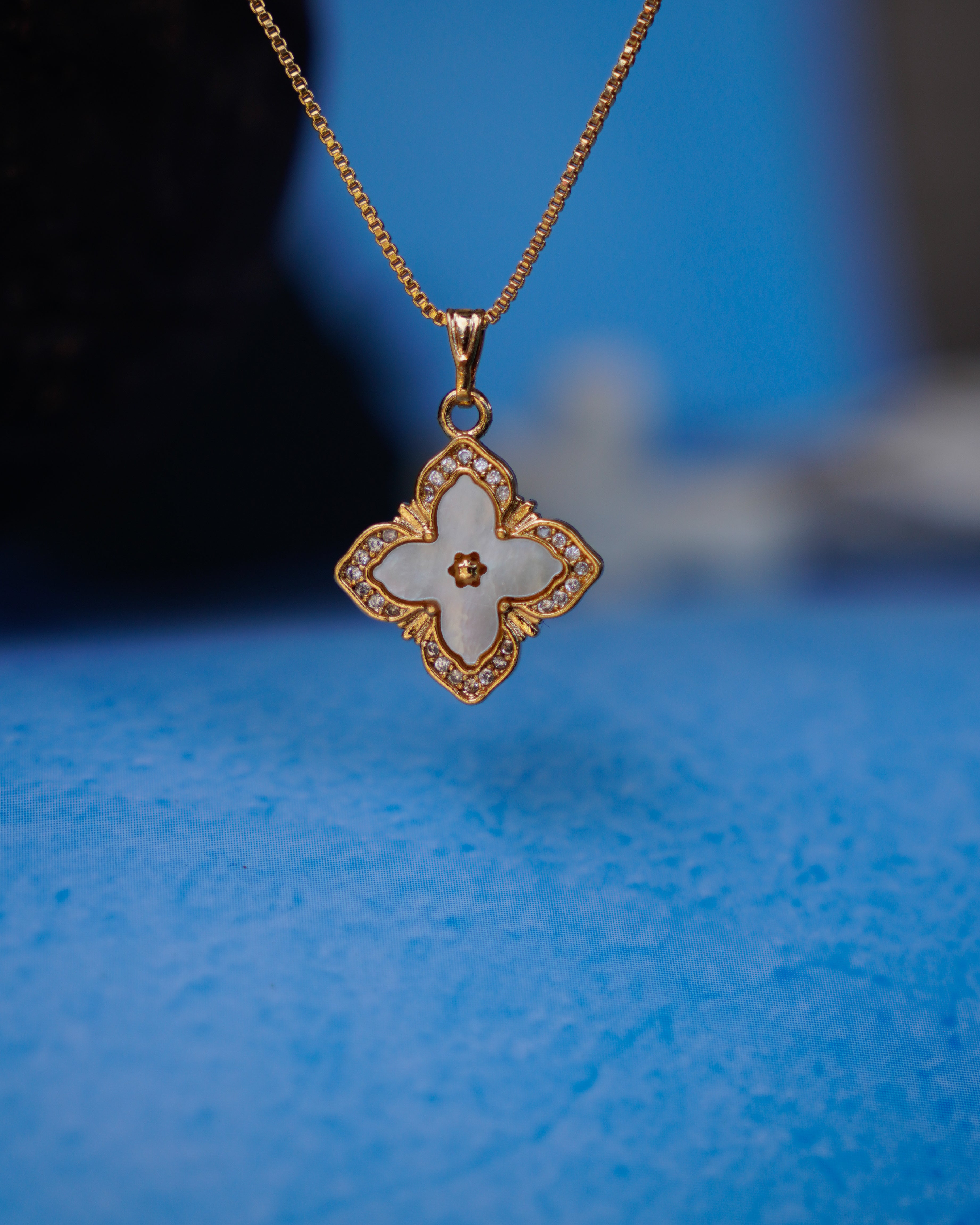 FLORA- Anti-Tarnish Gold Finish AD Clover Pendant Necklace with Mother of Pearl Shell