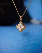 FLORA- Anti-Tarnish Gold Finish AD Clover Pendant Necklace with Mother of Pearl Shell