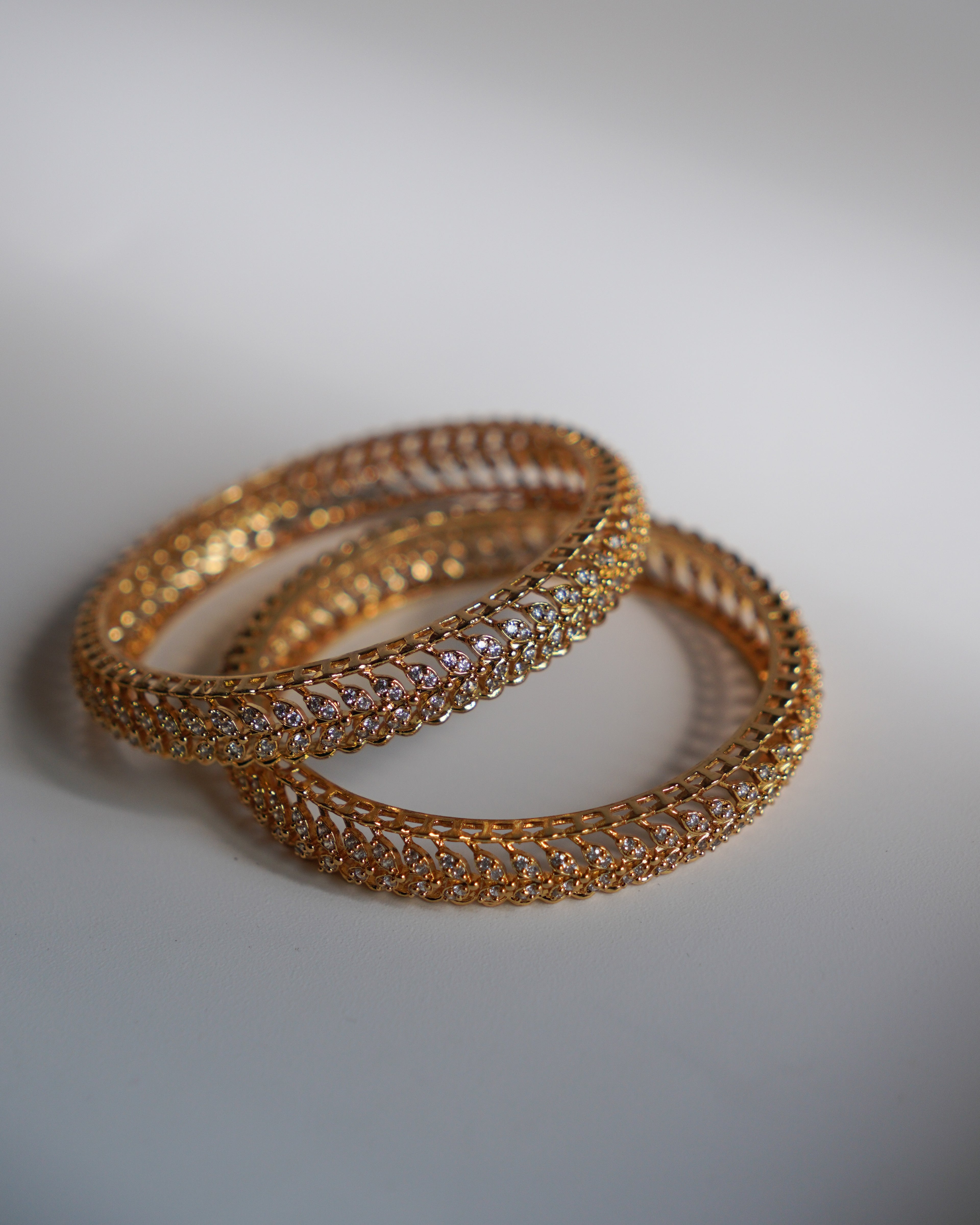 ORO- Leaf  Pattern American Diamond Studded Bangle