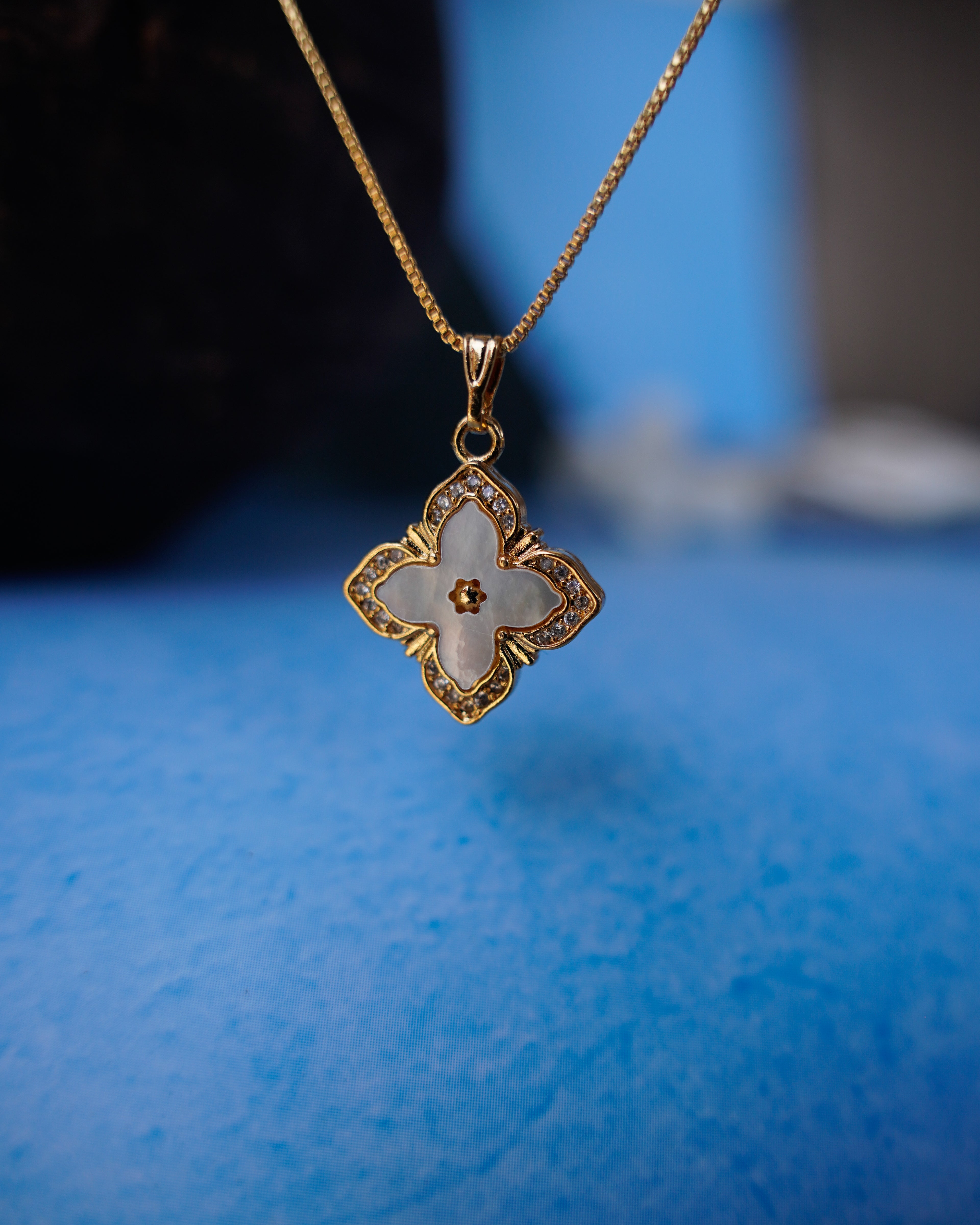FLORA- Anti-Tarnish Gold Finish AD Clover Pendant Necklace with Mother of Pearl Shell